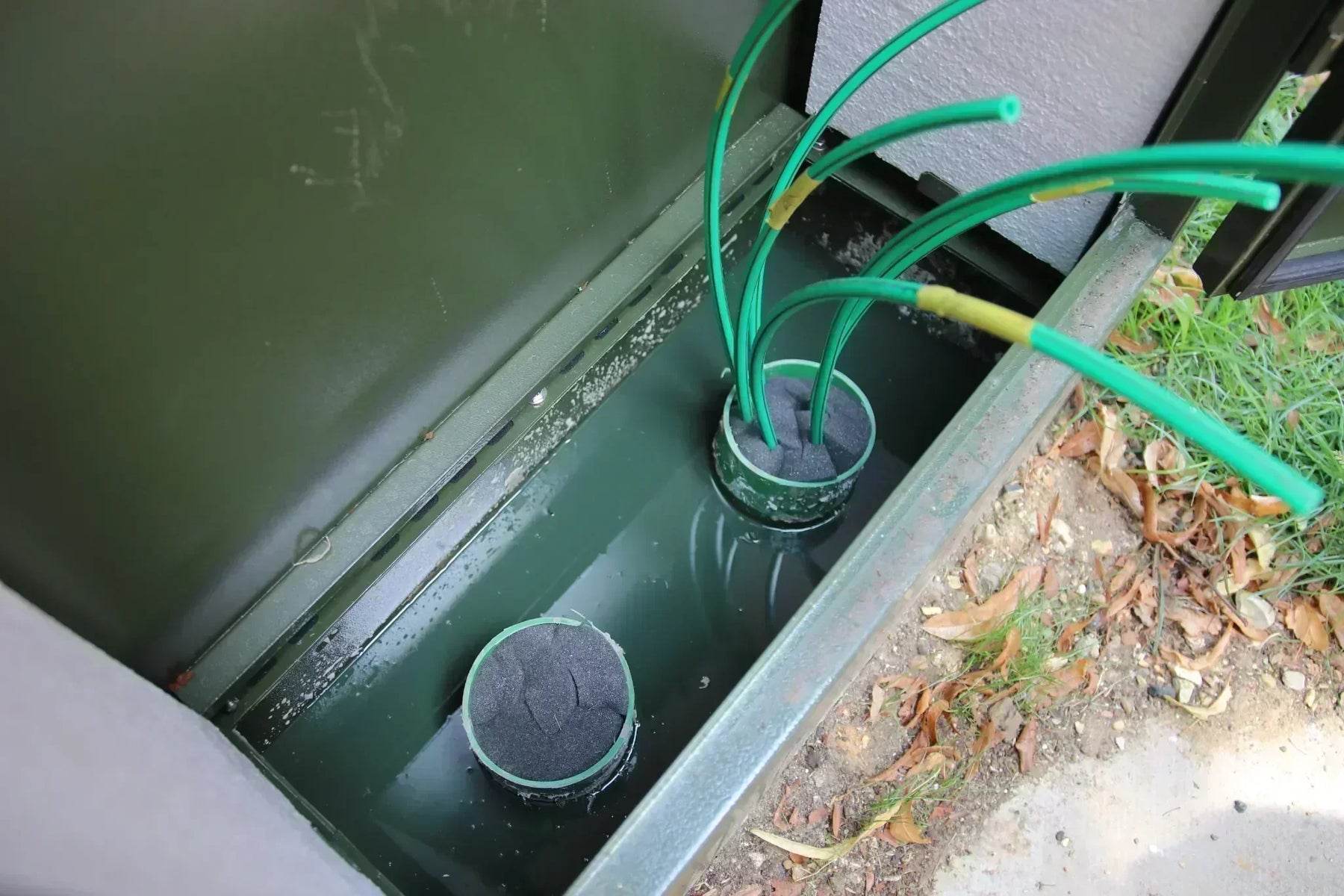 GreenStuff Cabinet Base Sealant installed within a Virgin Media Cabinet